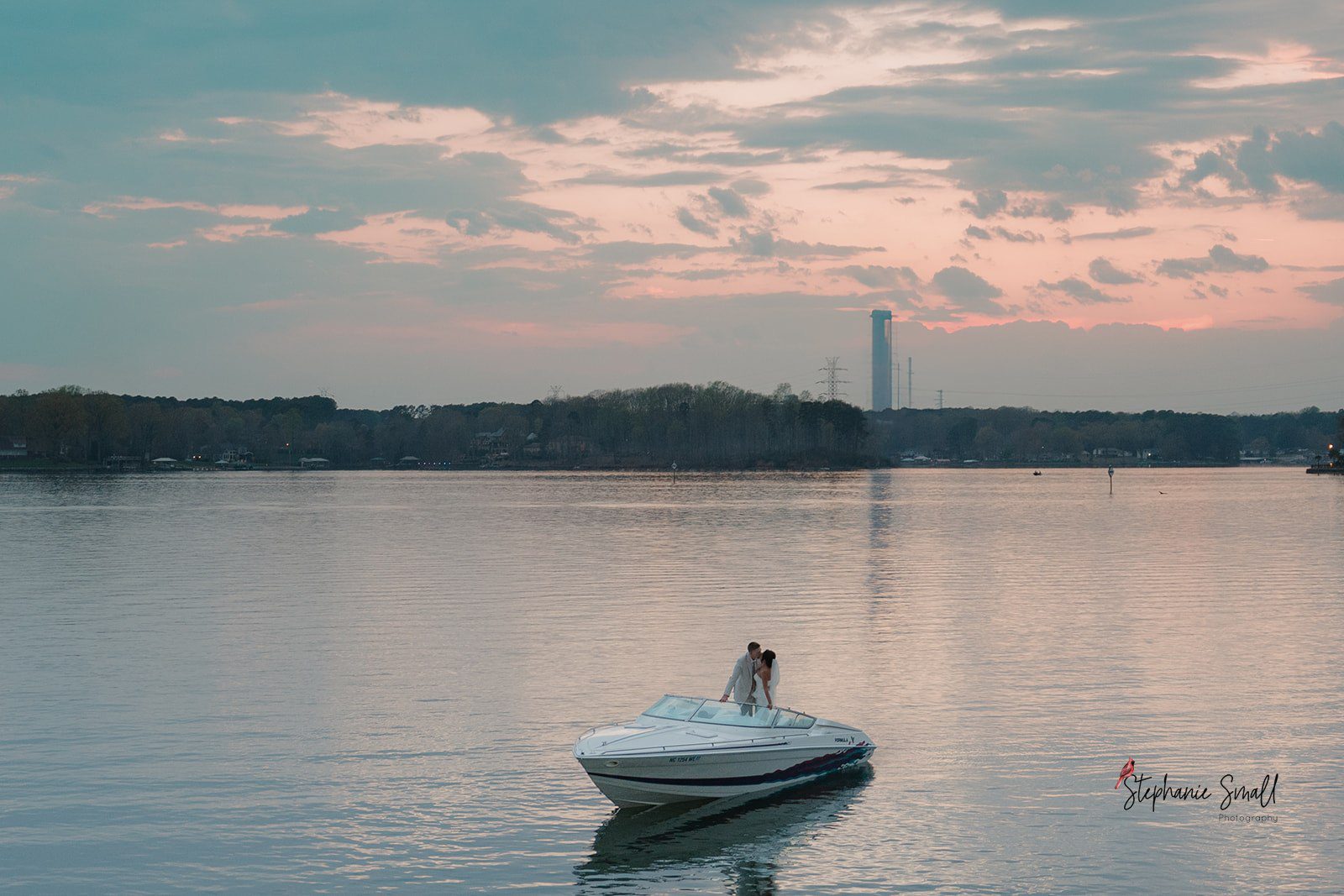 Outdoor waterfront wedding ceremony setup overlooking lake in North Carolina