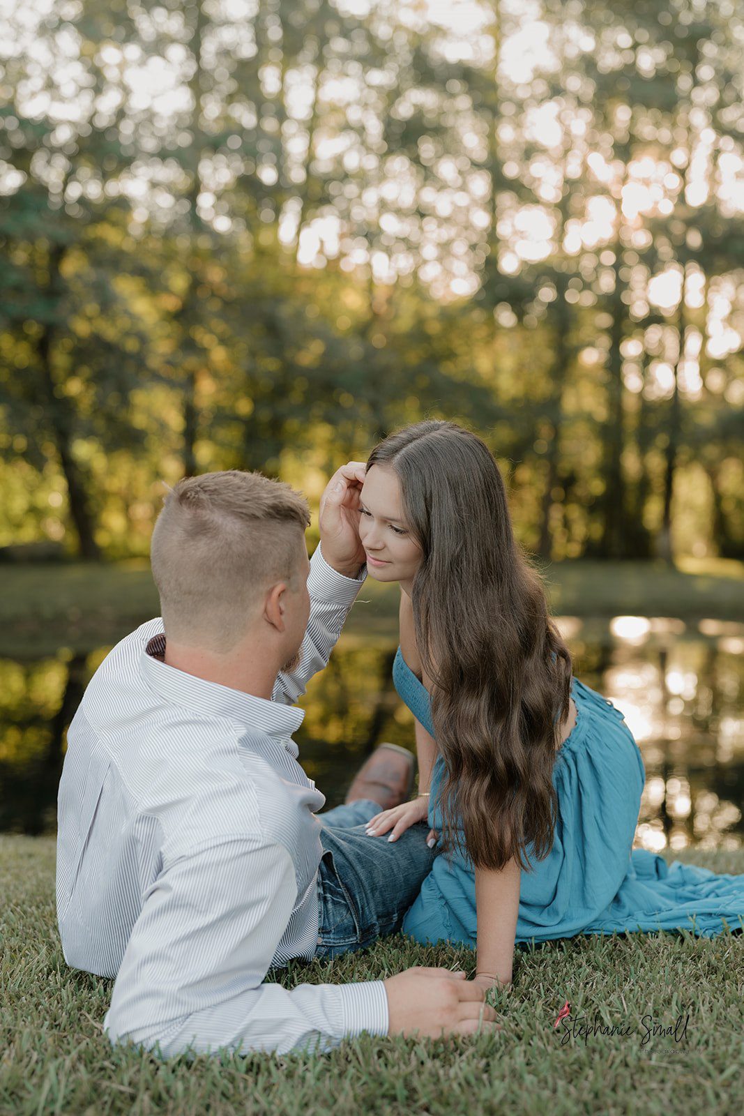 candid wedding photography moment of couple whispering and laughing
