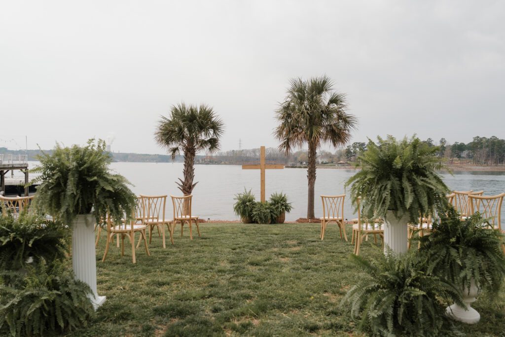 Waterfront ceremony setup for lakeside wedding North Carolina